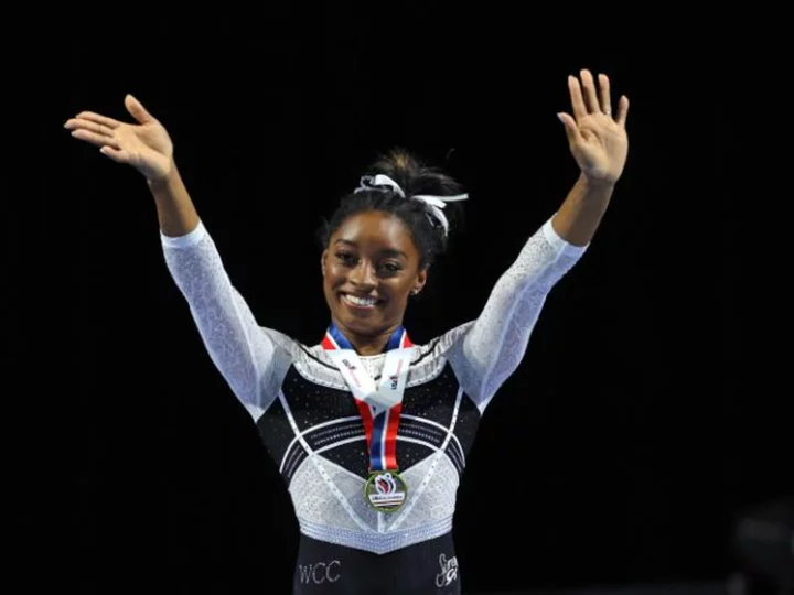 Simone Biles ends the first day of competition at the US Gymnastics Championships with the lead