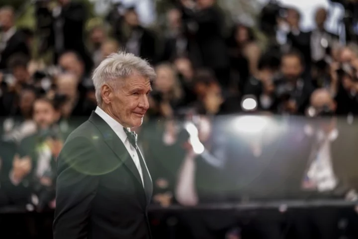 CANNES PHOTOS: Harrison Ford and Indiana Jones fever sweep Cannes on festival's 3rd day