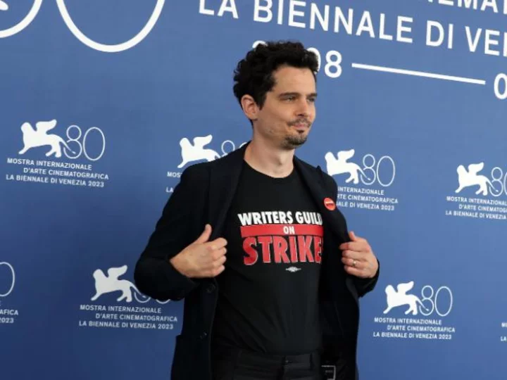 Damien Chazelle shows support for WGA strike at Venice Film Festival