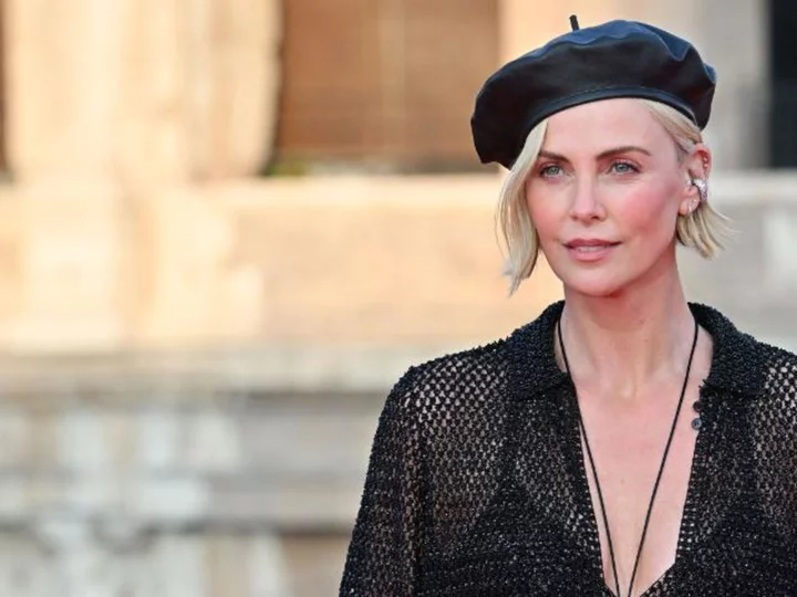 Charlize Theron denies she's had bad plastic surgery, says she's simply aging