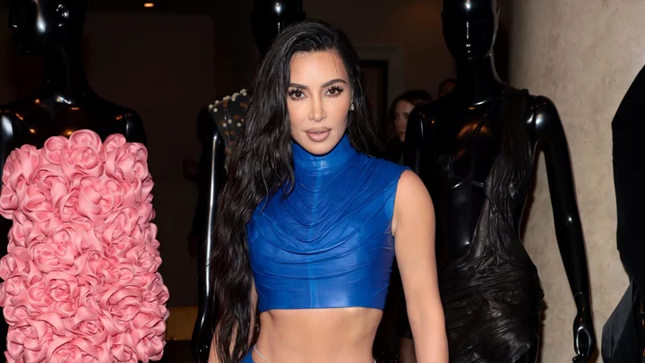 Kim Kardashian admits she cries herself to sleep amid challenging parenting journey