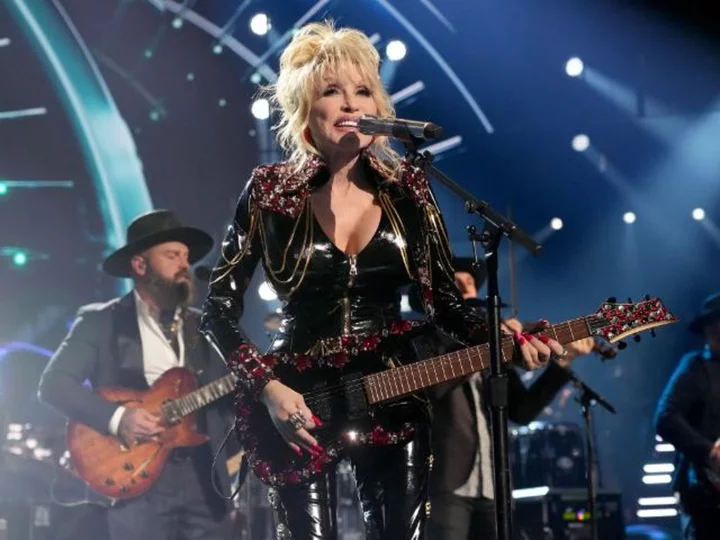 Dolly Parton jokes she'll 'hopefully drop dead in the middle of a song' someday before she ever retires