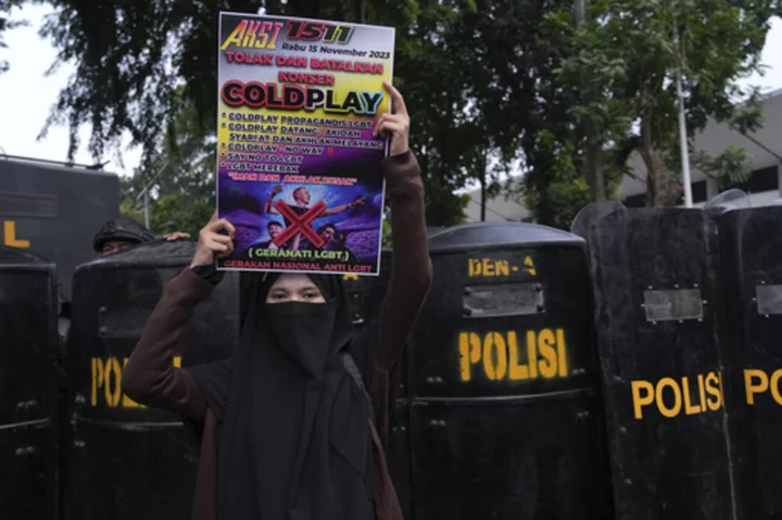 Conservative Muslims in Indonesia protest Coldplay concert over the band's LGBTQ+ support