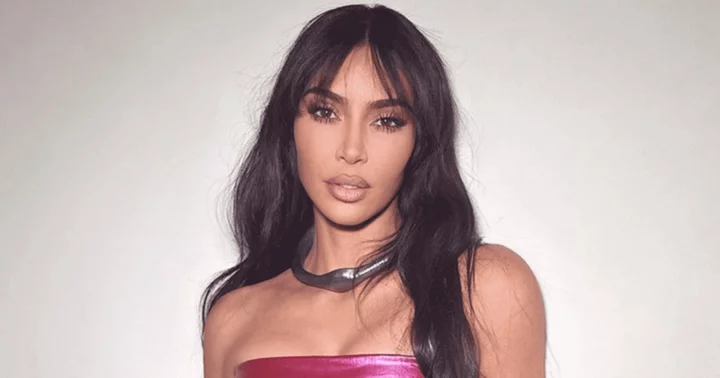 Kim Kardashian slammed for 'sickening display of vanity' after she takes hairstylist and makeup artist along to get DMV photo taken