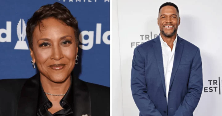 GMA's Robin Roberts has priceless reaction to Michael Strahan after he refuses to get up from her lap
