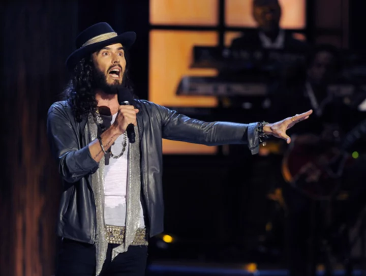 Comedian Russell Brand denies allegations of sexual assault published by three UK news organizations