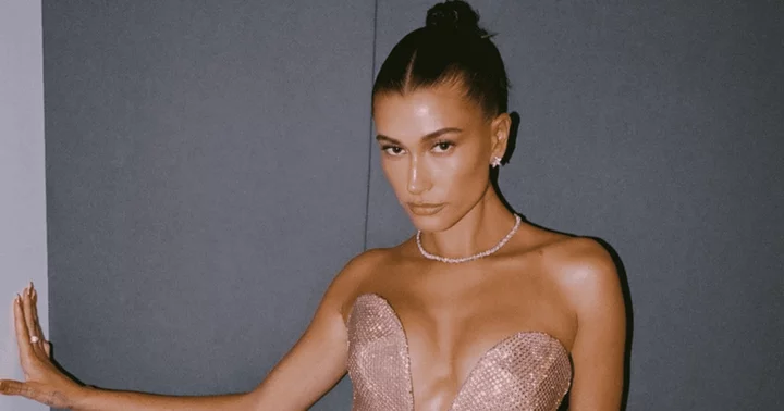 Hailey Bieber trolled for 'hideous' footwear choice as fans notice her big feet in photoshoot: 'Not doing socks and sandals era again'