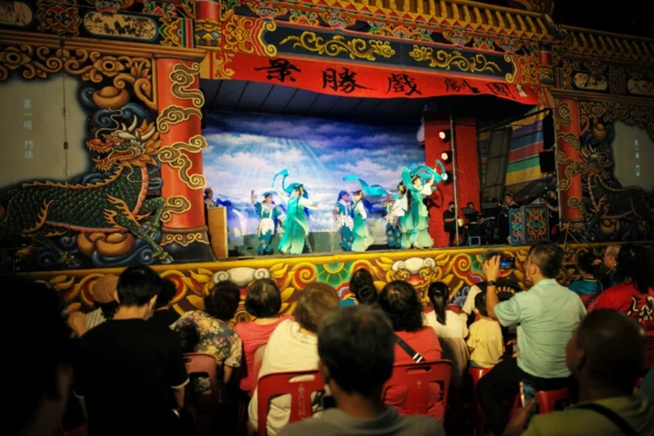 Taiwan singers won't let curtain fall on Hakka opera