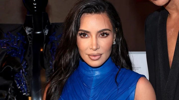 Kim Kardashian reacts to pregnant Kourtney Kardashian and Travis Barker’s baby news