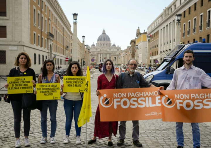 Climate activists tell Vatican court they never intended to hurt ancient statue in glue protest