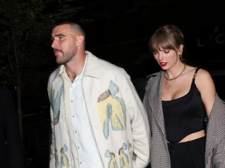 Taylor Swift and Travis Kelce's whirlwind week caps off with 'SNL' cameos -- and some hand-holding