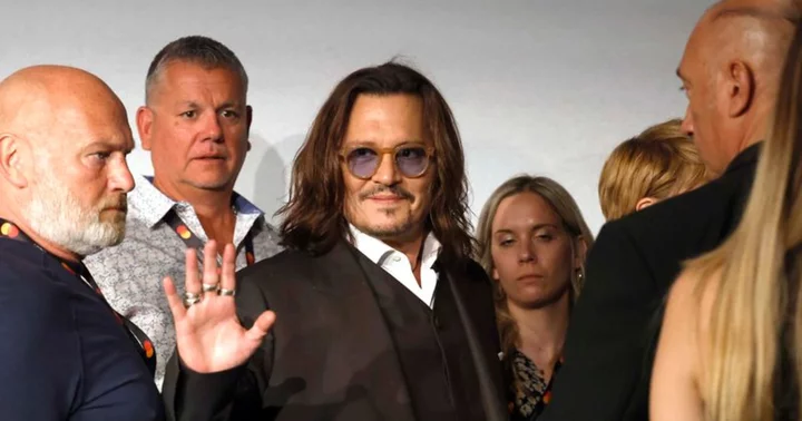 'Is he gonna blame Amber again?' Johnny Depp shredded for arriving late at Cannes presser for latest film