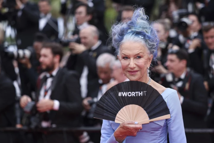 CANNES PHOTOS: Helen Mirren's blue hair, Johnny Depp's return and more Day 1 scenes