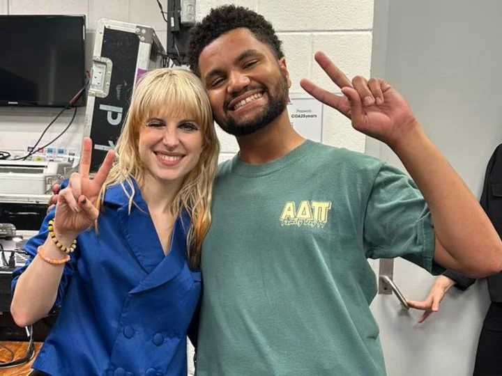 Florida Congressman Maxwell Frost performs 'Misery Business' on stage with Paramore