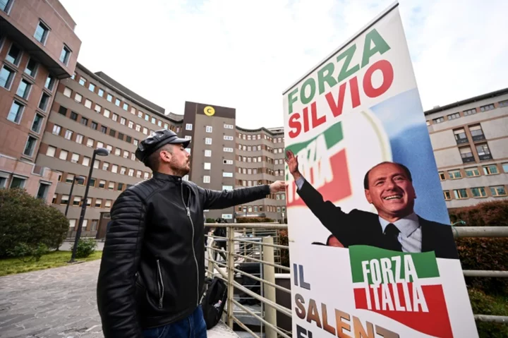 'I won again': Italy's Berlusconi home after six weeks in hospital