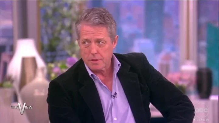 Hugh Grant declares he's a 'rabid Blink' after attending Blackpink concert