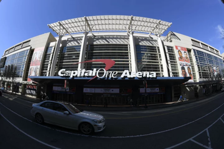Qatar sovereign wealth fund buys stake in Washington's NBA, NHL and WNBA teams, AP source says