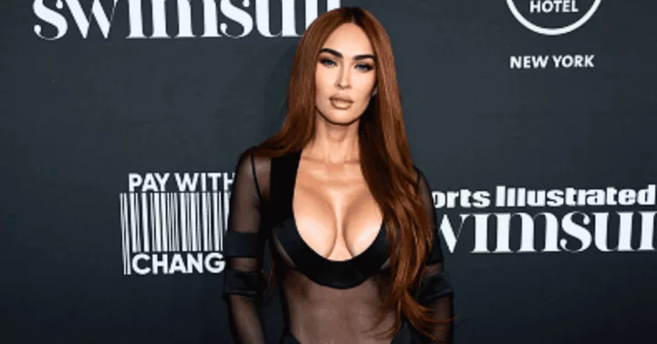 Megan Fox dazzles in daringly low-cut sheer dress after landing SI Swimsuit cover