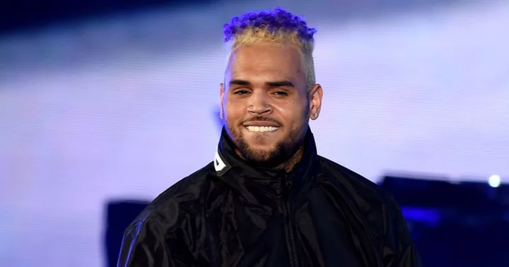 'They are still after him': Chris Brown faces arrest for nightclub assault if he returns to Britain