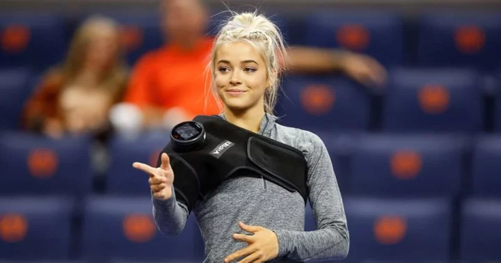 Olivia Dunne's mind-blowing flexibility while performing gymnastic moves in locker room leaves fans speechless: 'Literal goddess'