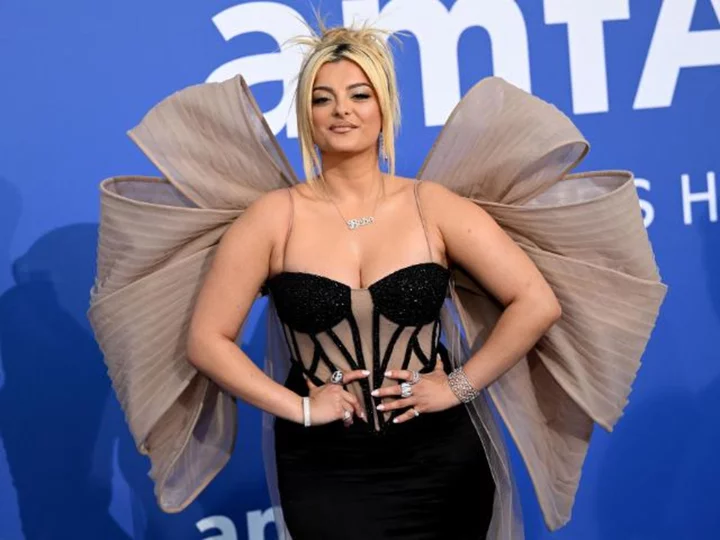 Bebe Rexha rushed off stage after she was hit in the head by a phone