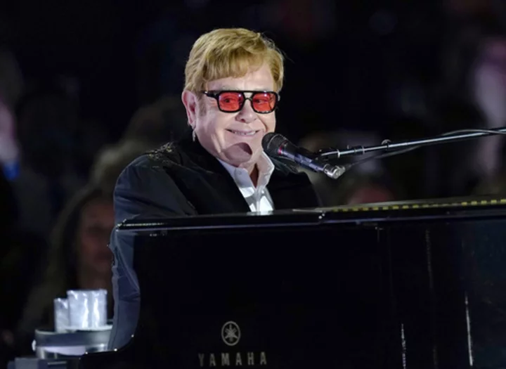 Britain's Parliament honors Elton John for his work fighting HIV in the UK and beyond