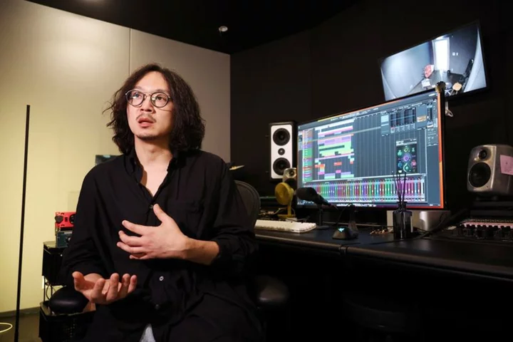 K-pop's biggest music label HYBE looks to lift language barrier with AI