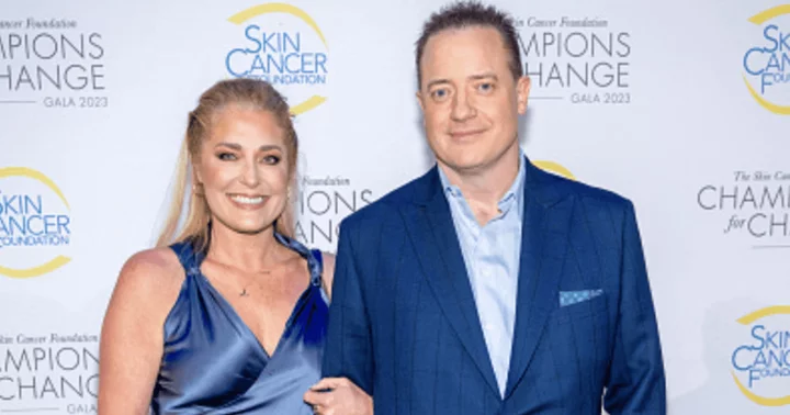 Brendan Fraser and girlfriend Jeanne Moore rock matching blue outfits, snuggling up at NYC charity gala