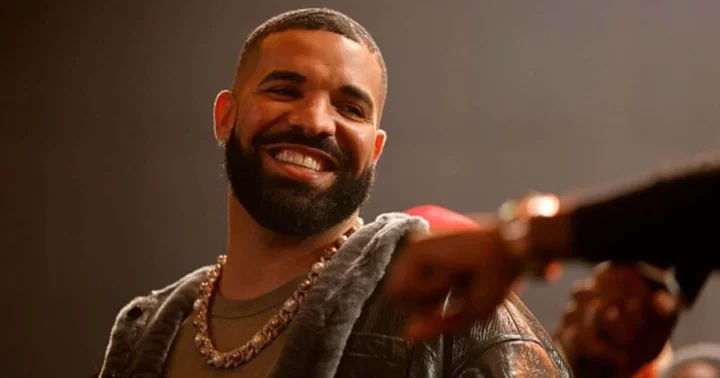 'That isn’t real': Fans react to 'younger Drake' hologram handing performer a book on stage