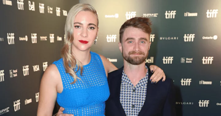 Daniel Radcliffe and Erin Darke beam with joy as they enjoy a stroll with their newborn in NYC on Father's Day