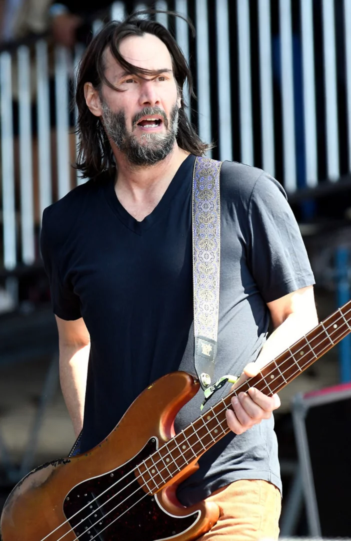 Keanu Reeves received bass guitar lessons from Flea