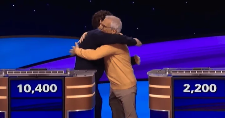 Matt Amodio embraces 'dearest friend' Sam Buttrey before latter's elimination from 'Jeopardy! Masters'