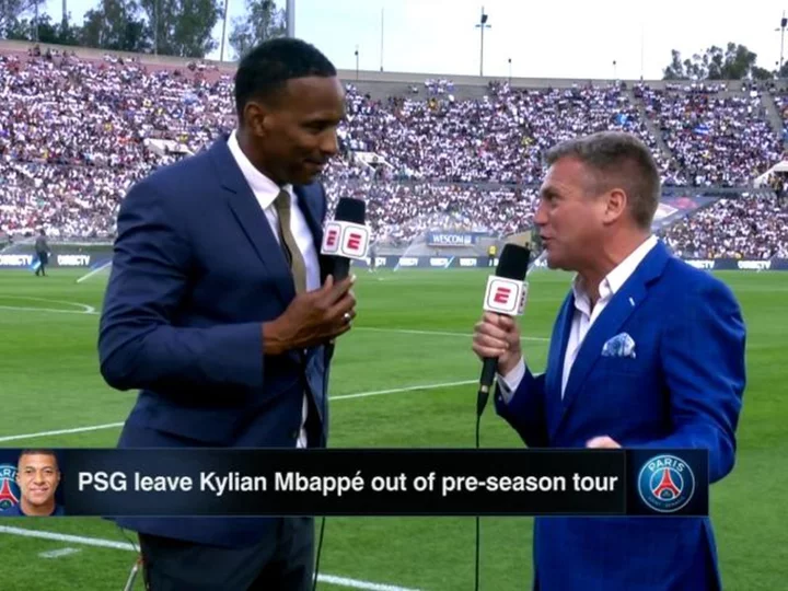 ESPN soccer analyst Shaka Hislop 'OK' after collapsing on air before a match between AC Milan and Real Madrid, co-host says