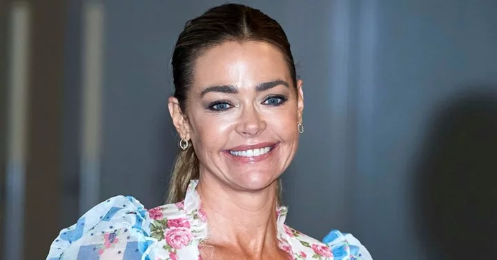 'RHOBH' alum Denise Richards slammed as she poses in Fourth of July photo draped in American flag: 'Complete disrespect'