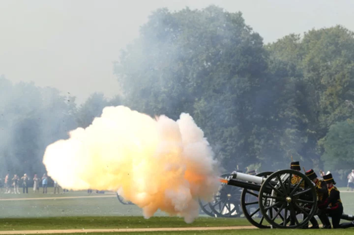 Queen Elizabeth II remembered a year after her death as gun salutes ring out for King Charles III