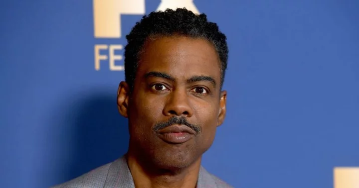 Chris Rock alerts police after peeping Tom climbs his fire escape and tries to film him through window