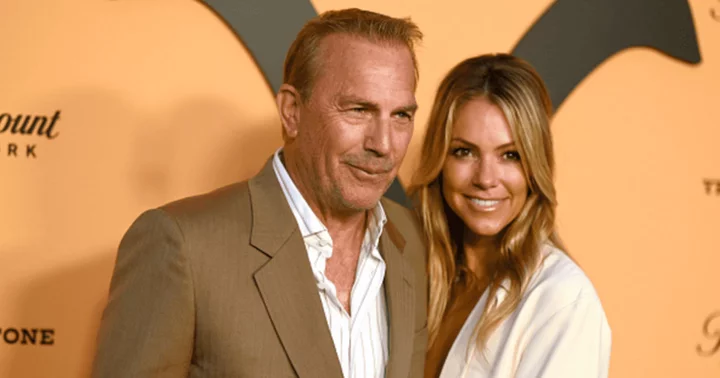 Kevin Costner's wife Christine Baumgartner refuses to leave home amid divorce to 'keep some normalcy' for children, claims friend